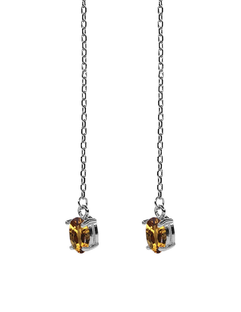 Aretes en plata .925 con baño en rodio blanco con piedra de citrinos naturales en forma oval con vista de 30 grados