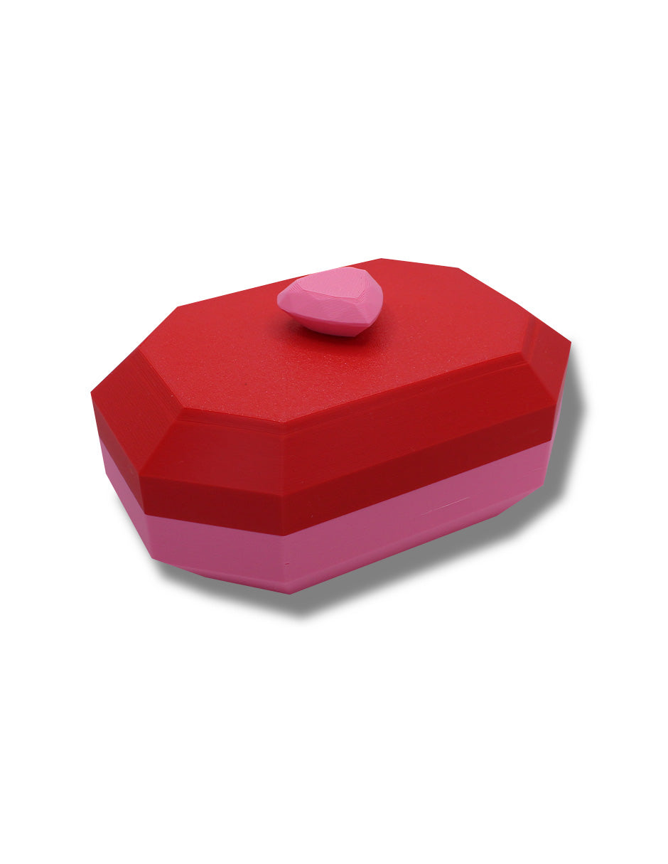 joyero forma octagonal el color tapa roja y base y agarradera en forma de corazón rosa