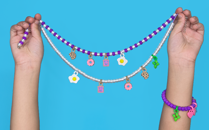 Joyería infantil Sanc Kids en azul — collar y pulsera con charms